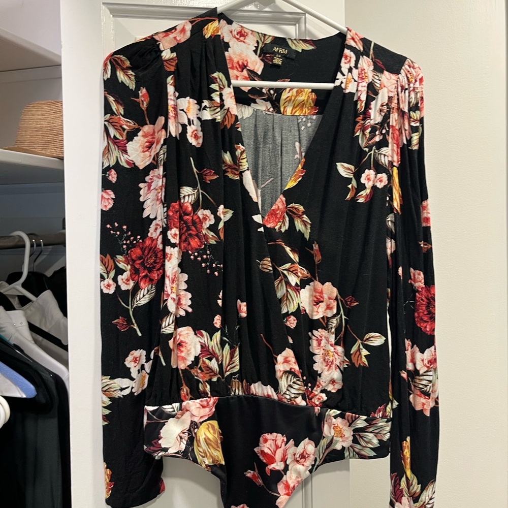 AFRM. Floral body suit. Size small.